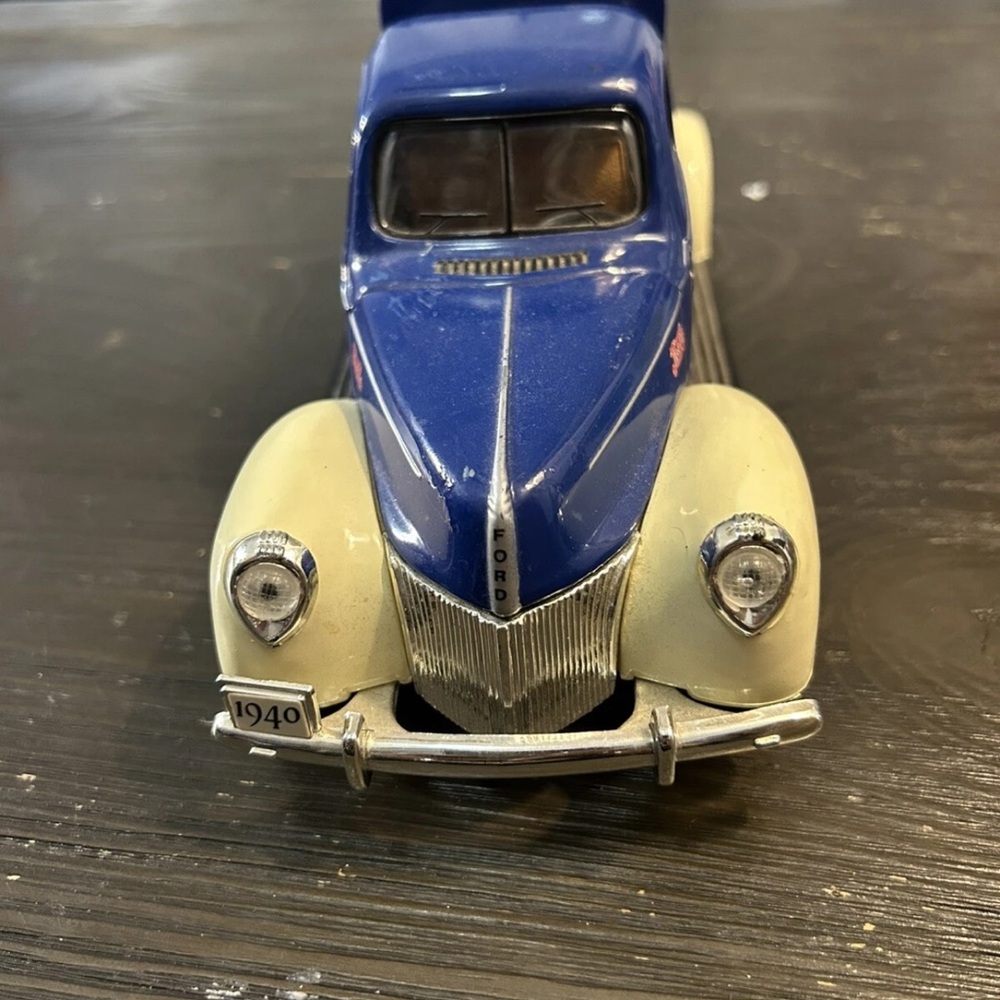 Blue and Cream Vintage Toy Car Model